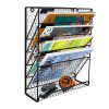 Durable black metal magazine rack with multiple tiers for organizing magazines, brochures, and catalogs in dental, medical, or optical clinics. Ideal for professional spaces needing efficient display solutions.