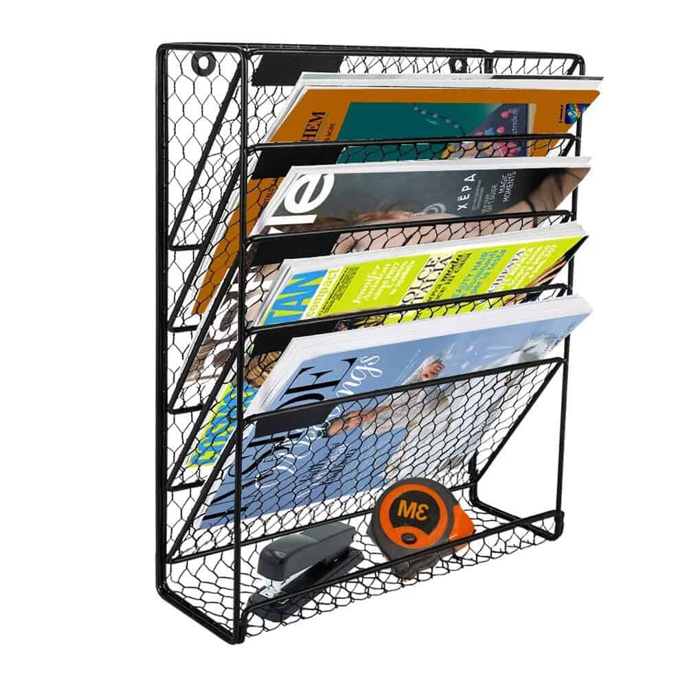 Alt text: Black metal wire magazine rack with multiple sliding compartments for organizing magazines, books, and documents efficiently in offices or home spaces.
