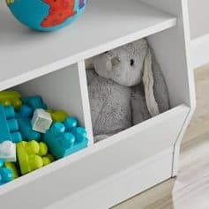 Bright white children's toy storage unit filled with colorful building blocks and a soft plush bunny toy. Perfect for organizing kids' toys and creating a fun play area.