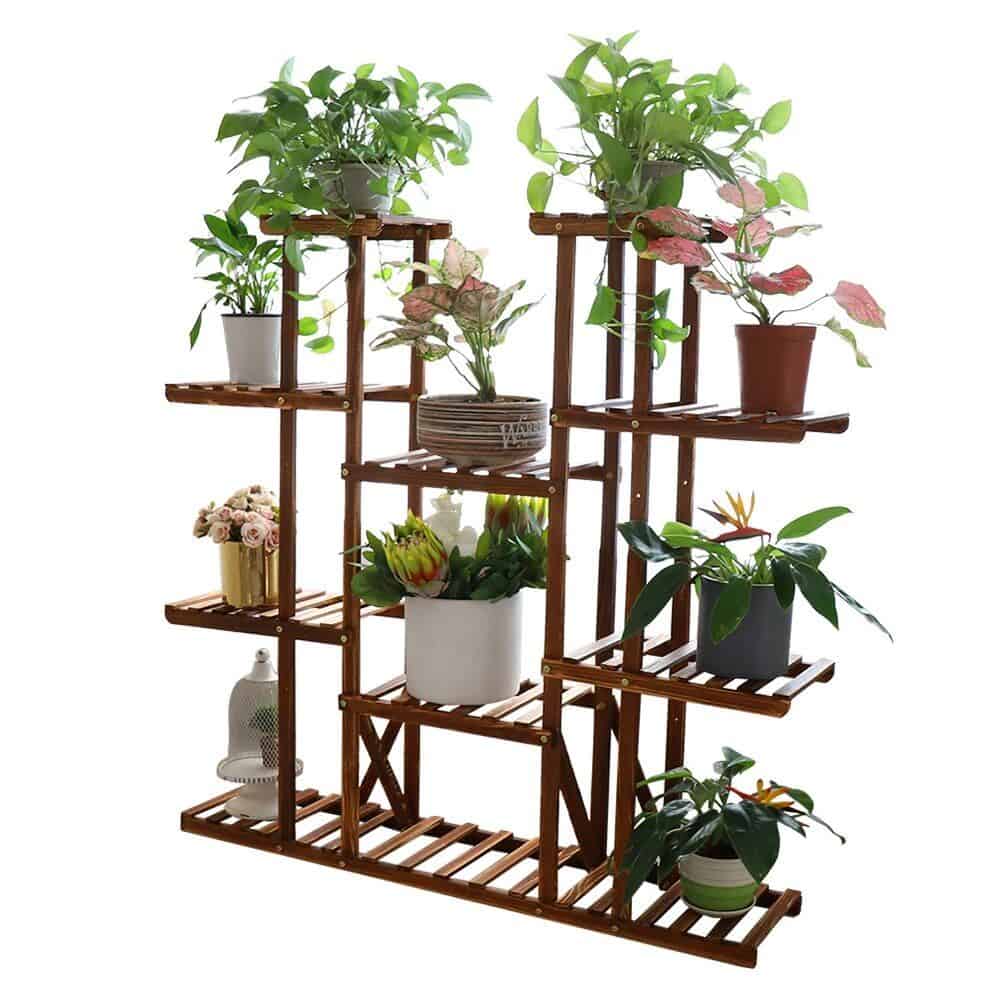 A beautiful wooden multi-tier plant stand featuring various potted houseplants, ideal for decorative and indoor gardening purposes. Perfect for enhancing home or office aesthetics.