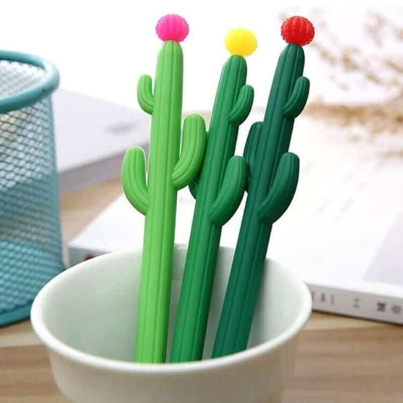 Cute cactus-shaped pens in green with colorful tops for fun desk accessories. Perfect for note-taking, gift idea, or adding a touch of greenery to your workspace.