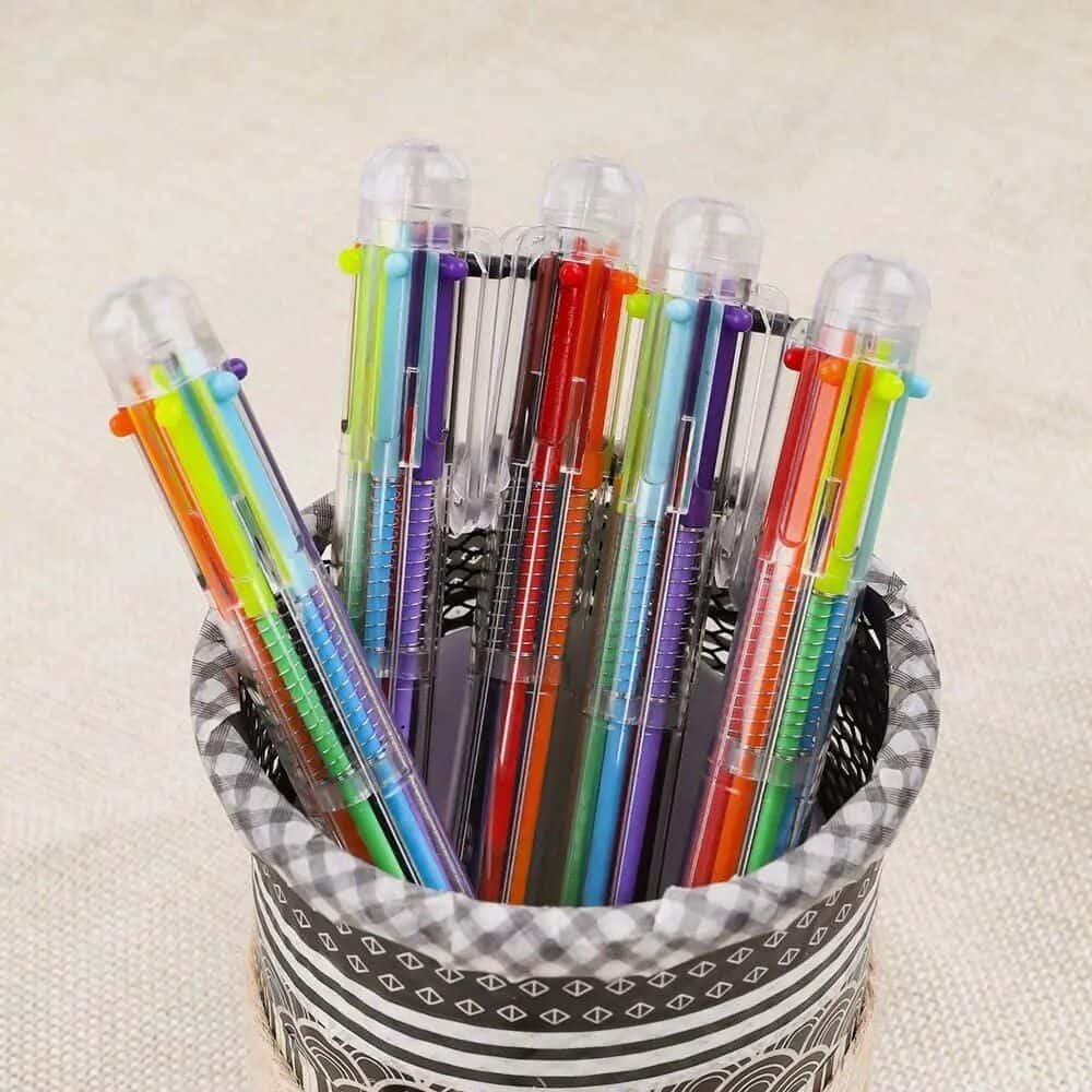 Bright multicolored gel pens in a black and white patterned holder, ideal for office, school, or artistic use, offering vibrant ink colors for writing and drawing perfection.