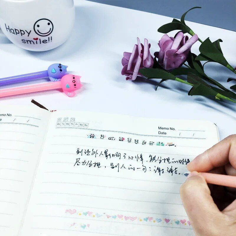 Cute smiley face pens with colorful ink, perfect for note-taking and journaling, adding fun and cheer to your day.