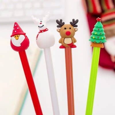 Festive Christmas-themed pens with Santa, reindeer, snowman, and Christmas tree designs, ideal for holiday stationery and gift ideas.