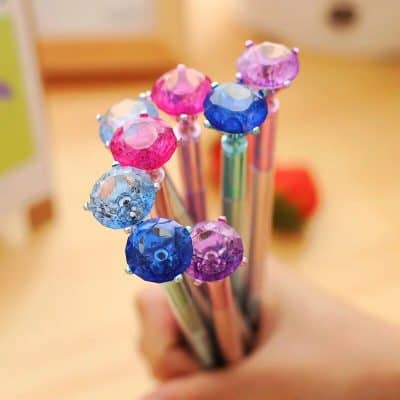 Vivid multicolor gemstone-themed pens with rhinestone accents, perfect for stationery enthusiasts and adding sparkle to your desk.