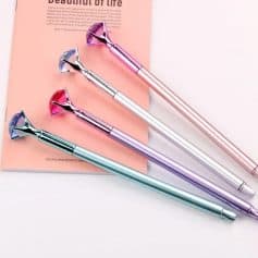 Colorful metallic eyelash curlers for flawless eye makeup and enhanced lashes. Perfect for beauty routines, available in pink, purple, blue, and silver at Monalisa Store.