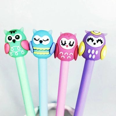 Bright owl pens with adorable cartoon designs in vibrant colors—ideal for school, office, or gifts. Features playful owl characters on pastel-colored barrels.