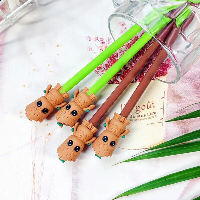 Cute lion-themed pen set for stationery lovers, featuring adorable lion head toppers in bright green and brown colors, perfect for office or school use.