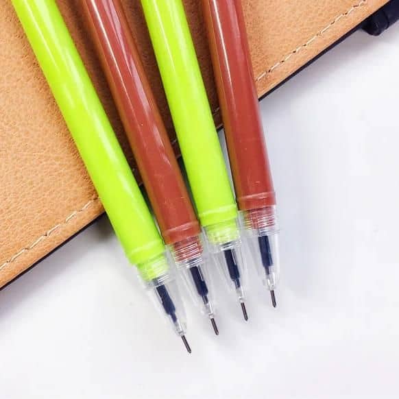 Bright green and brown ink pens with fine tips for precise drawing or writing, shown on a white background next to a brown notebook. Perfect for school, office, or artistic use.