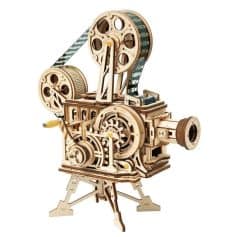 A wooden vintage film camera model with detailed gears and reels, representing classic cinema and filmmaking equipment, ideal for movie enthusiasts and film industry decor.