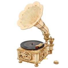 Vintage mechanical phonograph with wooden detailed craftsmanship for music lovers and collectors, perfect for nostalgic ambiance and stylish home décor.