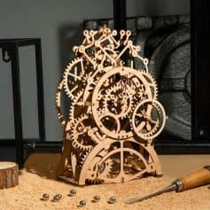 Intricate wooden gears clock, unique decor for optical stores and eyewear boutiques, showcasing craftsmanship and innovation in optical retail design.