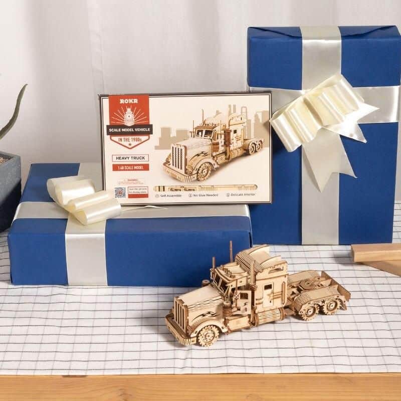Detailed wooden heavy truck model for collection or display. Perfect for train and vehicle enthusiasts. High-quality craftsmanship, ideal for gift or home decor.