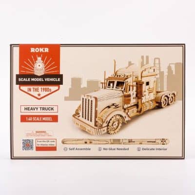 Detailed wooden scale model of a heavy truck, perfect for collectors and hobbyists, with easy self-assembly and realistic design inspired by 1980s truck models.