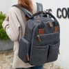 A stylish and durable black backpack designed for daily commuting, travel, and work, featuring multiple compartments, sturdy material, and ergonomic straps. Perfect for professionals and students.