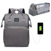 Stylish gray travel backpack with USB charging port, spacious compartments, and ergonomic design for versatile trips and daily use. Perfect for work, travel, or school.