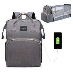 Stylish gray travel backpack with USB charging port, spacious compartments, and ergonomic design for versatile trips and daily use. Perfect for work, travel, or school.