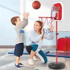 Children enjoying indoor basketball game with mini hoop and ball for kids' active play at Monalisa Medical Store.
