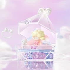 Adorable mermaid girl figurine with pastel colors, accompanied by a tiny cat figure, inside a clear decorative box with a pink and purple theme, perfect for cute collectibles and gift ideas.