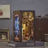 Detailed handcrafted miniature toy house featuring intricate design and internal lighting, perfect for collectors and as a unique home decor piece.