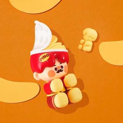 Colorful Pino character toy with bright yellow and red accents, fun cartoon style, ideal for children's decor or collectibles.
