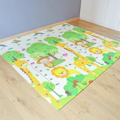Colorful children's playroom rug featuring elephants, lions, giraffes, trees, and playful animals; perfect for kids' bedrooms or play areas, adding vibrant, educational decor.