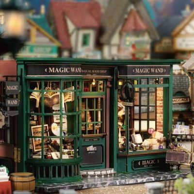 Charming miniature shop window showcasing magic-themed eyewear, accessories, and novelty optics products for an enchanting shopping experience.
