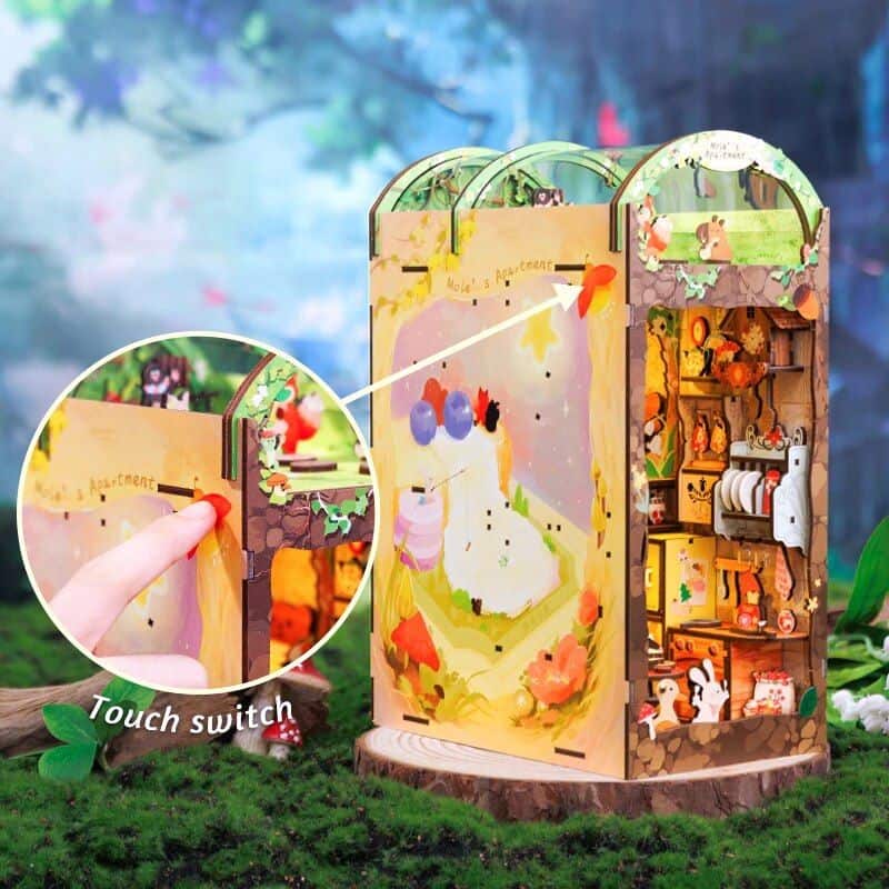 Colorful children's storytelling toy with touch-sensitive switch for interactive play, featuring animal figurines and scenic artwork, perfect for educational entertainment.