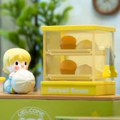 Bright yellow toy storage box for sweet bean and dessert toys, featuring a cute