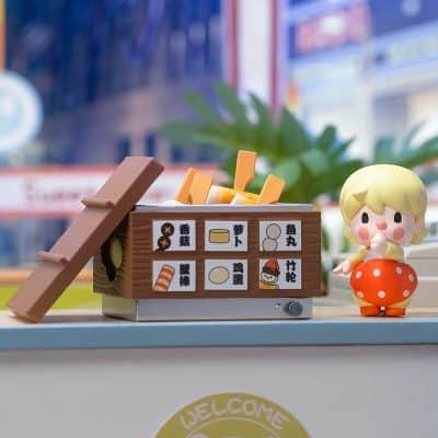 Colorful toy sushi and vegetables with Japanese labels, perfect for educational play and learning about Japanese cuisine.