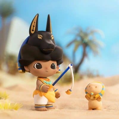 Cute Egyptian-themed toy figure with traditional attire and accessories, perfect for children and collectors interested in Egyptian history, culture, and mythology.