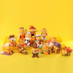 Playful Monalisa Store toy collection with vibrant animal and character figures, ideal for kids' entertainment, collection, or as colorful decor. Bright yellow setting highlights the fun, cheerful atmosphere.