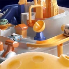 Colorful toy race track for kids with cars and construction set, perfect for fostering imagination and fine motor skills. Bright, durable design suitable for children’s playrooms.