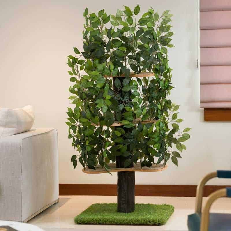 Indoor decorative artificial tree with lush green leaves, perfect for home or office décor to enhance aesthetic appeal.