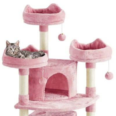 Soft pink cat condo with multi-level platforms, scratching posts, and dangling balls for play, perfect for small cats and kittens to enjoy comfort and entertainment.