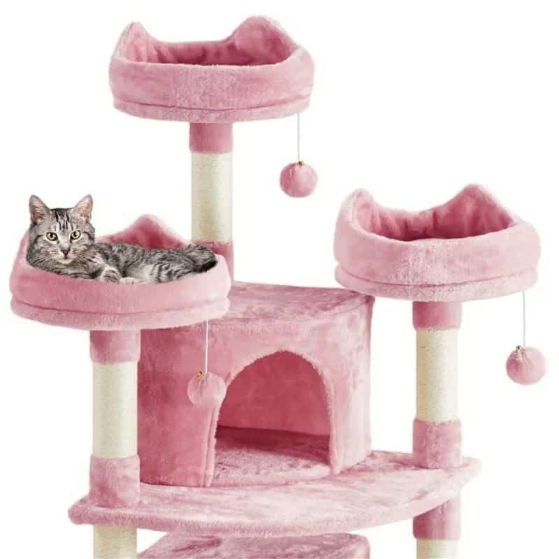 Soft pink cat condo with multi-level platforms, scratching posts, and dangling balls for play, perfect for small cats and kittens to enjoy comfort and entertainment.