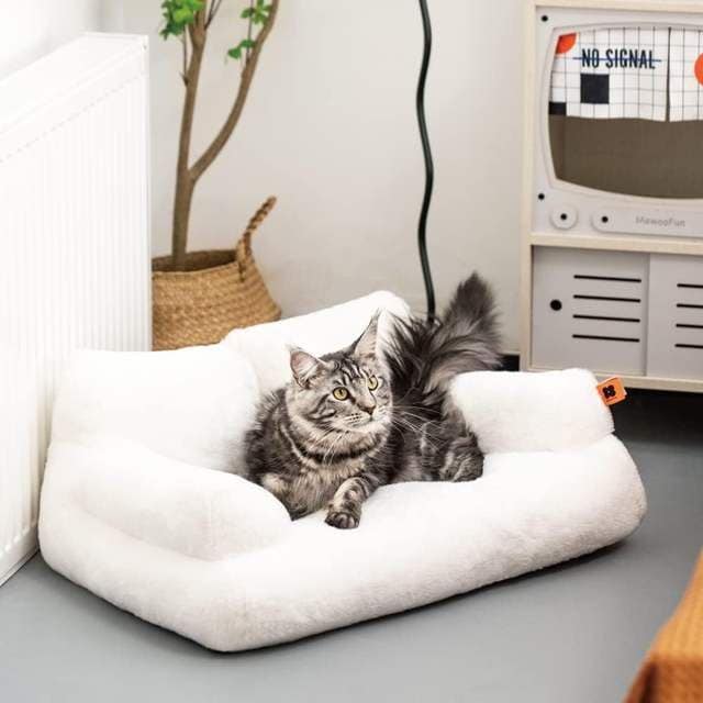 High-quality plush cat bed for comfort and style, perfect for pets to relax indoors. Enhance your pet’s comfort with a soft, durable, and stylish resting spot in your home.