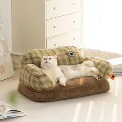 Soft, plaid cat bed with plush interior for comfortable lounging. Ideal for small cats or kittens, featuring durable fabric and cute design, perfect for pet owners seeking quality feline furniture.