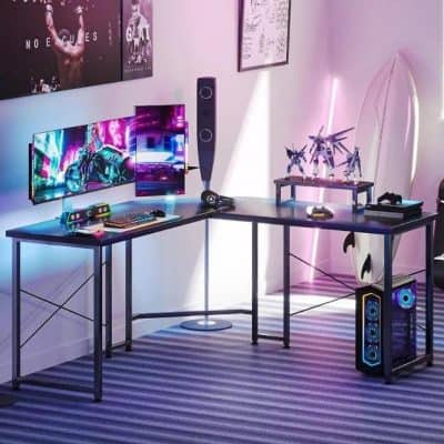 A high-tech gaming station featuring dual monitors, RGB lighting, a gaming keyboard and mouse, and a sleek desk setup ideal for gaming enthusiasts and streamers.