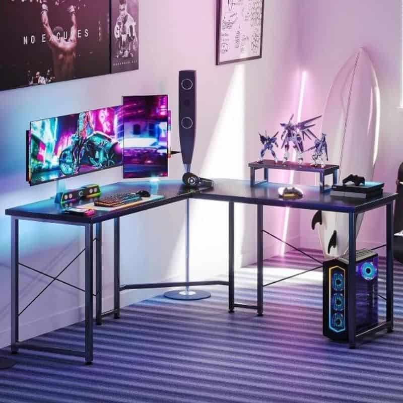 A high-tech gaming station featuring dual monitors, RGB lighting, a gaming keyboard and mouse, and a sleek desk setup ideal for gaming enthusiasts and streamers.