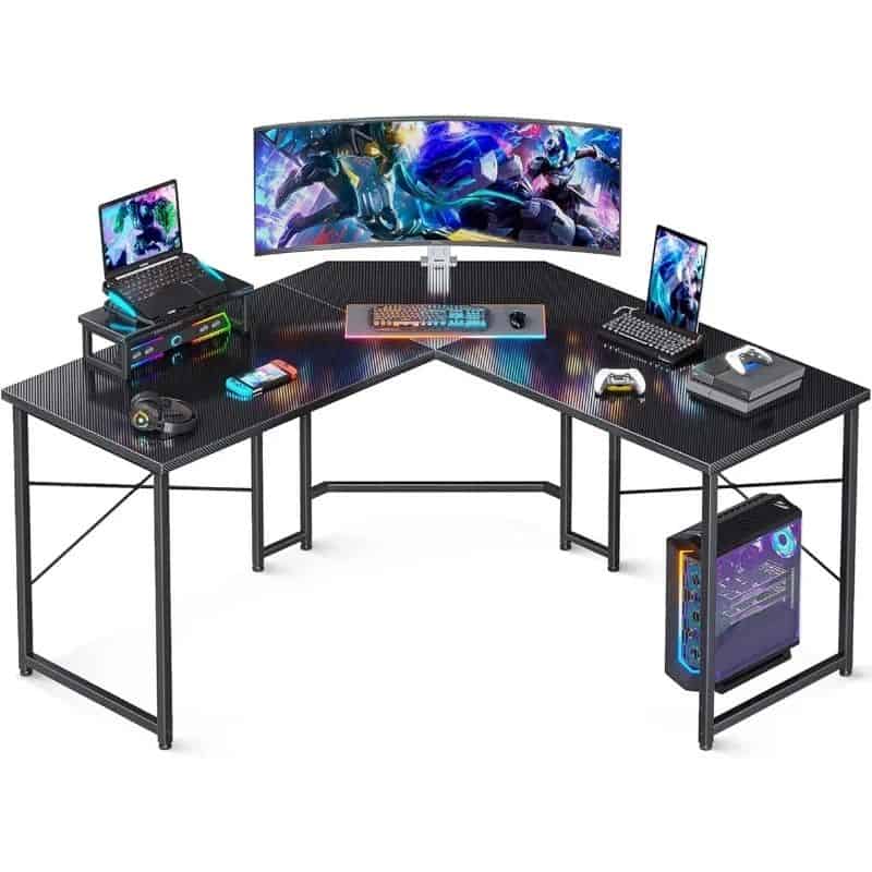 An ergonomic gaming desk with curved monitor, dual screens, gaming keyboard, mouse, and accessories, perfect for pro gamers and streamers seeking a stylish workspace.