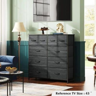 Stylish gray dresser from Monalisa Store with black handles, perfect for modern living rooms. Features decorative items like a horse sculpture and a tray, combining elegance and functionality.