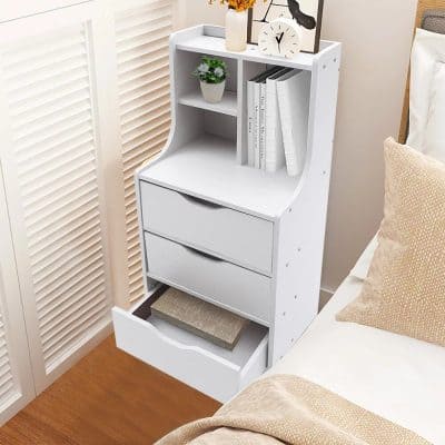 Stylish white bedroom storage table with drawers, perfect for organizing books, decor, and essentials. Modern design complements bedroom decor. Ideal for bedside or living room.
