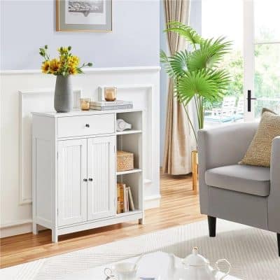 Elegant white storage cabinet with shelves and drawers, ideal for living room organization, showcasing books, decor, and accessories in a stylish setting.