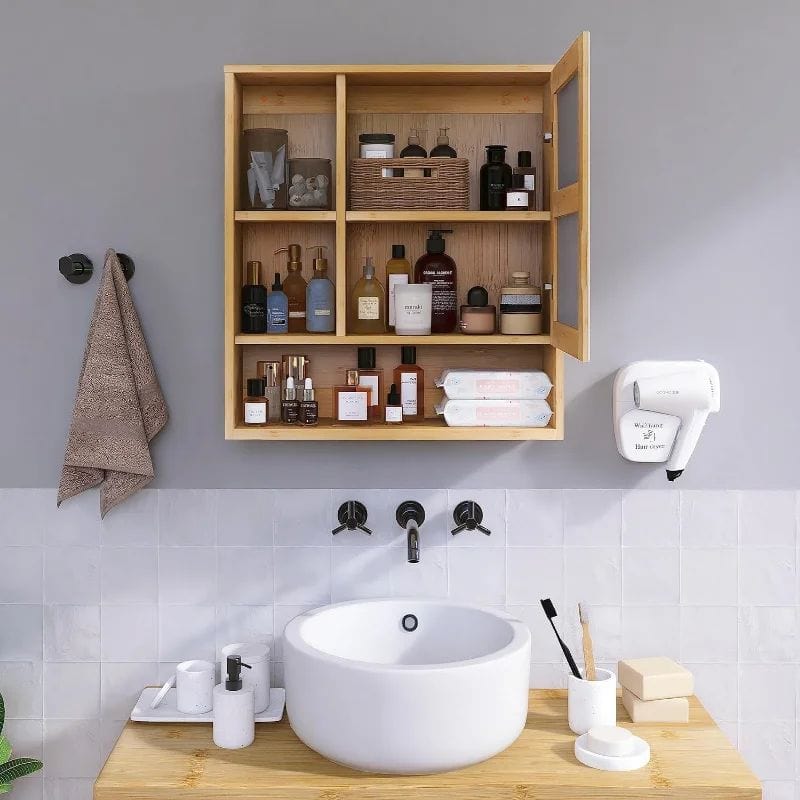A minimalist bathroom with a wooden medicine cabinet filled with skincare and beauty products, a sleek white sink, and modern black fixtures, perfect for a stylish skincare routine.