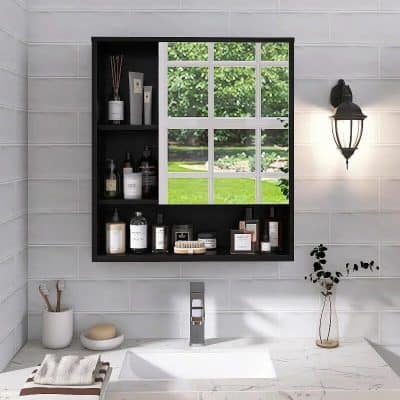 Bright bathroom mirror with organized shelves for skincare and toiletries.