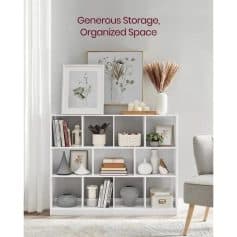 Beautifully organized white shelving unit with decorative vases, plants, and books, showcasing a tidy, stylish space for home decor and storage solutions at Monalisa Store.