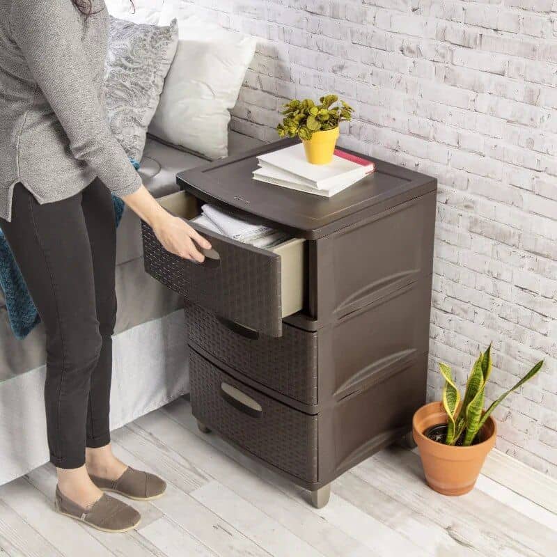 Stylish dark brown bedroom nightstand with multiple drawers for organization and space-saving, essential for modern bedroom setups, suitable for home decor and furniture shopping.