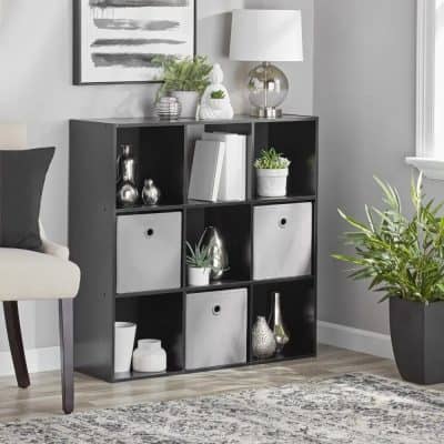 Stylish black and gray modular storage for optical accessories and eyewear organization. Perfect for opticians and eyewear retailers, combining modern design with practical storage solutions.