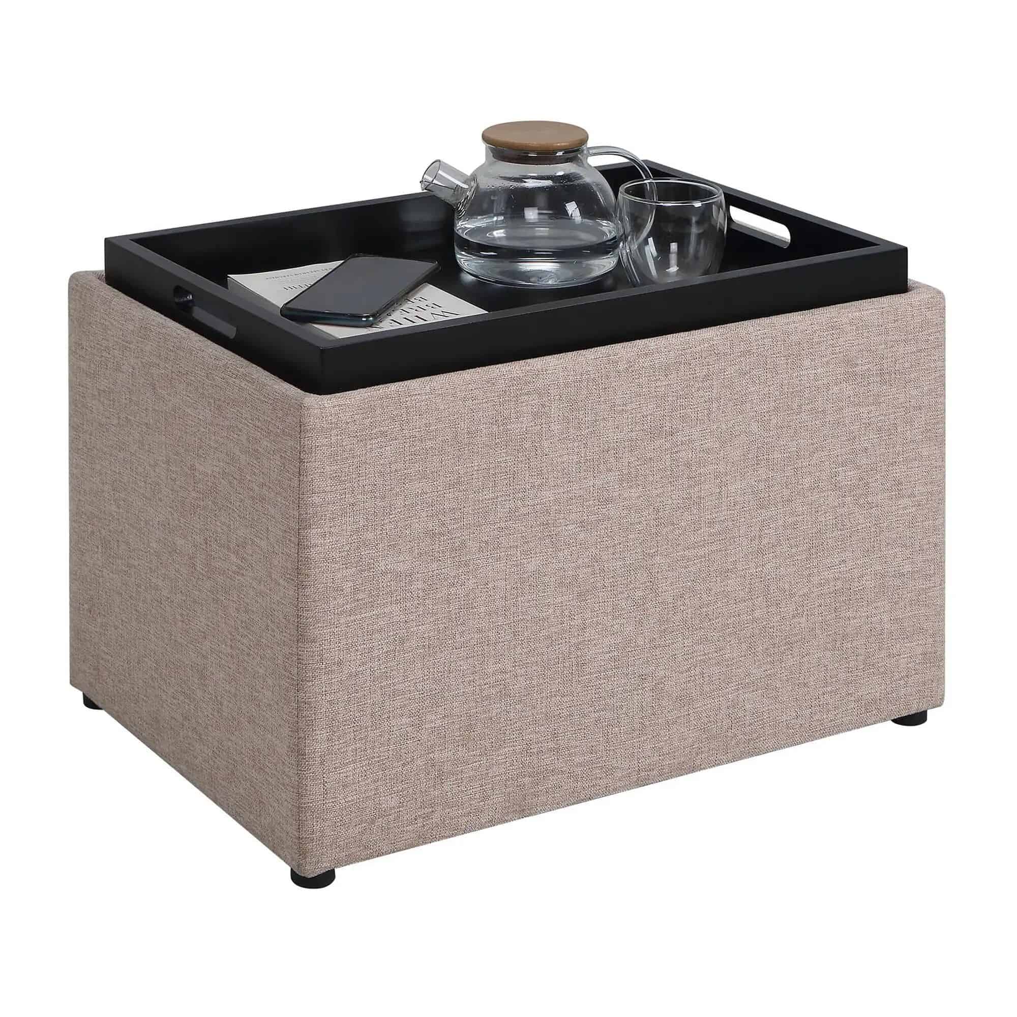 A beige storage ottoman with a convenient black tray surface, ideal for organization, decoration, and operational needs in optometry clinics or medical retail spaces.